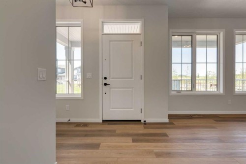 32 Ellen Lane, Crossfield, AB - Indoor Photo Showing Other Room