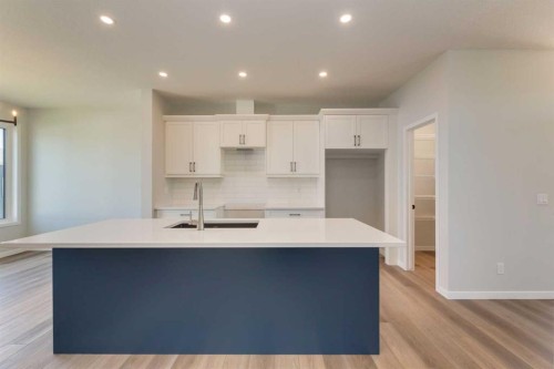 32 Ellen Lane, Crossfield, AB - Indoor Photo Showing Kitchen With Upgraded Kitchen