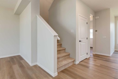 32 Ellen Lane, Crossfield, AB - Indoor Photo Showing Other Room