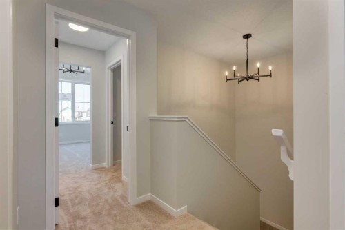 32 Ellen Lane, Crossfield, AB - Indoor Photo Showing Other Room