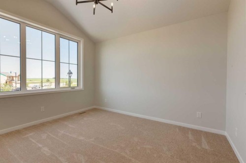 32 Ellen Lane, Crossfield, AB - Indoor Photo Showing Other Room