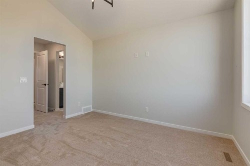 32 Ellen Lane, Crossfield, AB - Indoor Photo Showing Other Room