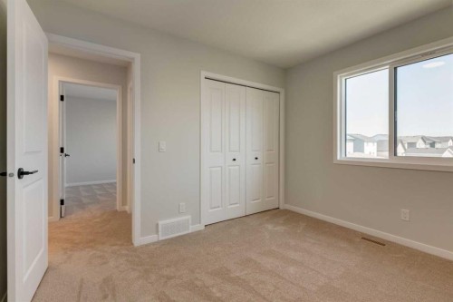 32 Ellen Lane, Crossfield, AB - Indoor Photo Showing Other Room