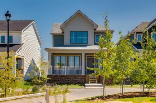 32 Ellen Lane, Crossfield, AB - Outdoor With Deck Patio Veranda With Facade