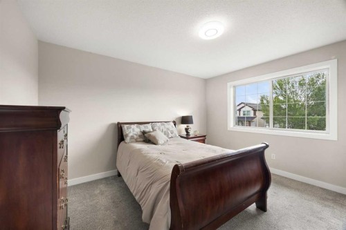 223 Coventry Road Ne, Calgary, AB - Indoor Photo Showing Bedroom