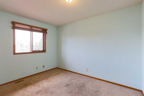 89 Athabasca Crescent, Crossfield, AB - Indoor Photo Showing Other Room