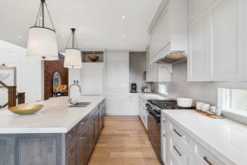 67 Aspen Ridge Square Sw, Calgary, AB - Indoor Photo Showing Kitchen With Double Sink With Upgraded Kitchen