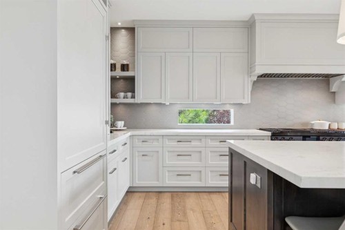 67 Aspen Ridge Square Sw, Calgary, AB - Indoor Photo Showing Kitchen With Upgraded Kitchen