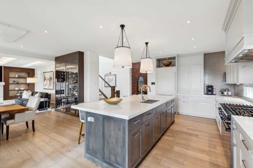 67 Aspen Ridge Square Sw, Calgary, AB - Indoor Photo Showing Kitchen With Double Sink With Upgraded Kitchen