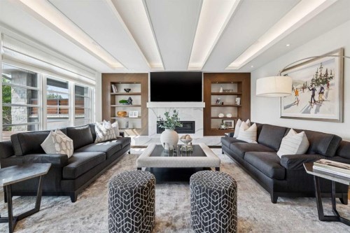 67 Aspen Ridge Square Sw, Calgary, AB - Indoor Photo Showing Living Room With Fireplace