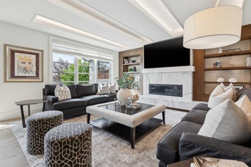 67 Aspen Ridge Square Sw, Calgary, AB - Indoor Photo Showing Living Room With Fireplace