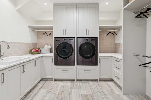 67 Aspen Ridge Square Sw, Calgary, AB - Indoor Photo Showing Laundry Room