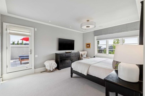 67 Aspen Ridge Square Sw, Calgary, AB - Indoor Photo Showing Bedroom