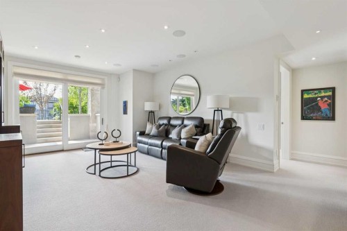 67 Aspen Ridge Square Sw, Calgary, AB - Indoor Photo Showing Living Room