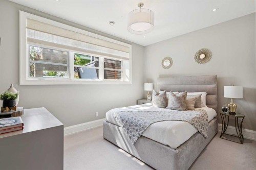 67 Aspen Ridge Square Sw, Calgary, AB - Indoor Photo Showing Bedroom