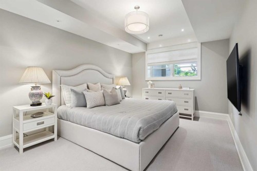 67 Aspen Ridge Square Sw, Calgary, AB - Indoor Photo Showing Bedroom