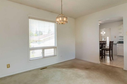 228 Maple Court Crescent Se, Calgary, AB - Indoor Photo Showing Other Room
