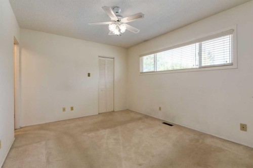 228 Maple Court Crescent Se, Calgary, AB - Indoor Photo Showing Other Room