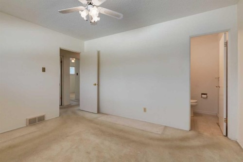 228 Maple Court Crescent Se, Calgary, AB - Indoor Photo Showing Other Room