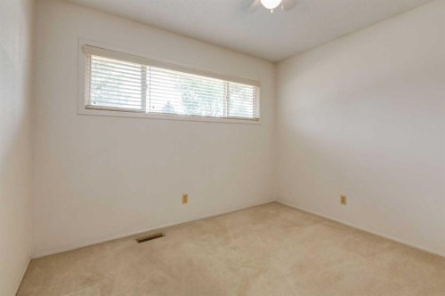 228 Maple Court Crescent Se, Calgary, AB - Indoor Photo Showing Other Room