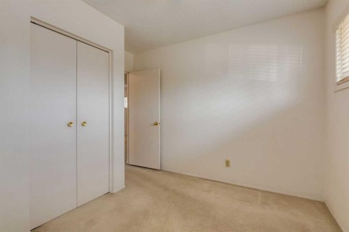 228 Maple Court Crescent Se, Calgary, AB - Indoor Photo Showing Other Room