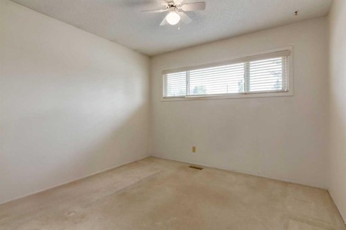 228 Maple Court Crescent Se, Calgary, AB - Indoor Photo Showing Other Room
