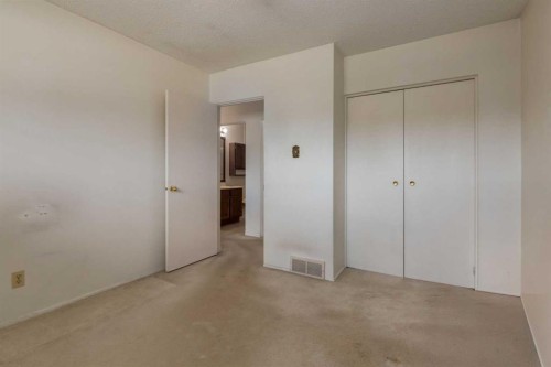 228 Maple Court Crescent Se, Calgary, AB - Indoor Photo Showing Other Room