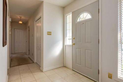 228 Maple Court Crescent Se, Calgary, AB - Indoor Photo Showing Other Room
