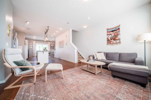 211 Copperpond Common Se, Calgary, AB - Indoor Photo Showing Living Room