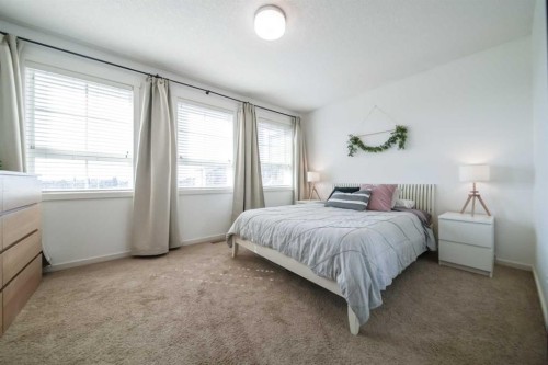 211 Copperpond Common Se, Calgary, AB - Indoor Photo Showing Bedroom