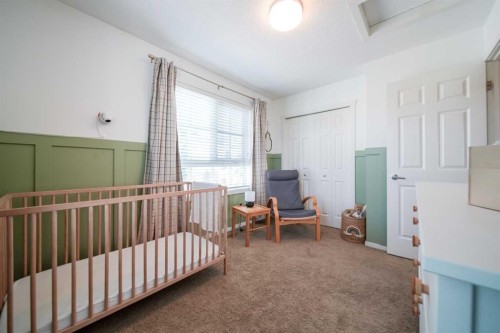 211 Copperpond Common Se, Calgary, AB - Indoor Photo Showing Bedroom