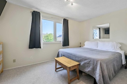 37 Erin Woods Place Se, Calgary, AB - Indoor Photo Showing Bedroom