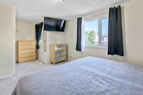 37 Erin Woods Place Se, Calgary, AB - Indoor Photo Showing Bedroom