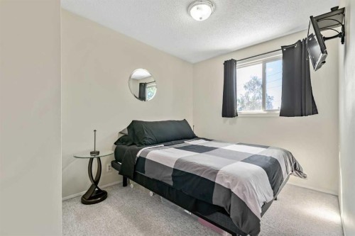 37 Erin Woods Place Se, Calgary, AB - Indoor Photo Showing Bedroom