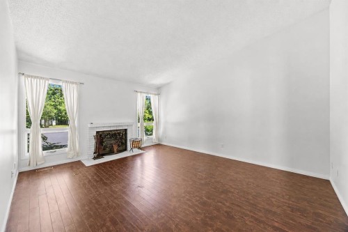 28 Templegreen Bay Ne, Calgary, AB - Indoor With Fireplace