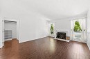28 Templegreen Bay Ne, Calgary, AB  - Indoor Photo Showing Living Room With Fireplace 