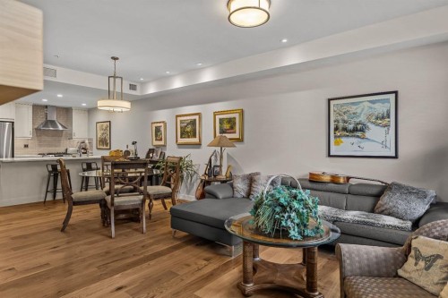 102-707 Spring Creek Drive, Canmore, AB - Indoor Photo Showing Living Room