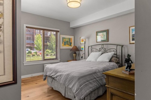 102-707 Spring Creek Drive, Canmore, AB - Indoor Photo Showing Bedroom