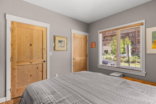 102-707 Spring Creek Drive, Canmore, AB - Indoor Photo Showing Bedroom