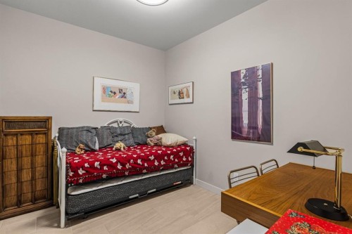 102-707 Spring Creek Drive, Canmore, AB - Indoor Photo Showing Bedroom