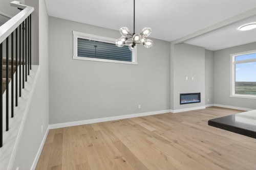 120 Southbow Avenue, Cochrane, AB - Indoor With Fireplace