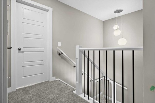 67 Agate Road, Cochrane, AB - Indoor Photo Showing Other Room