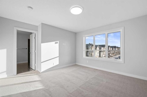 67 Agate Road, Cochrane, AB - Indoor Photo Showing Other Room