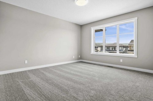 67 Agate Road, Cochrane, AB - Indoor Photo Showing Other Room