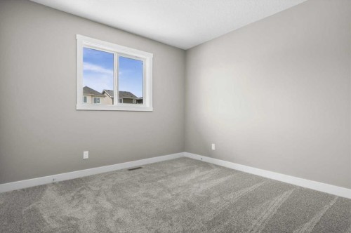 67 Agate Road, Cochrane, AB - Indoor Photo Showing Other Room