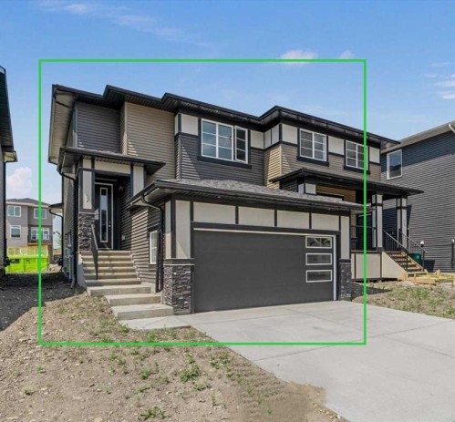 67 Agate Road, Cochrane, AB - Outdoor With Facade