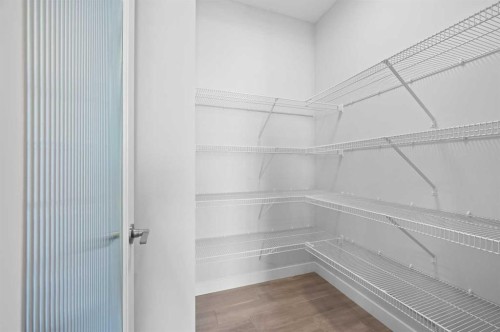 67 Agate Road, Cochrane, AB - Indoor With Storage