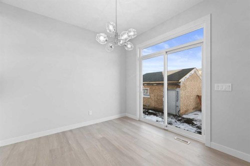 67 Agate Road, Cochrane, AB - Indoor Photo Showing Other Room