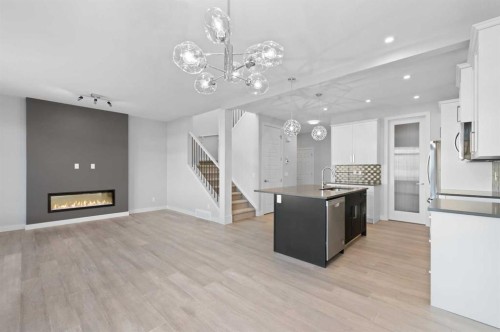 67 Agate Road, Cochrane, AB - Indoor Photo Showing Kitchen