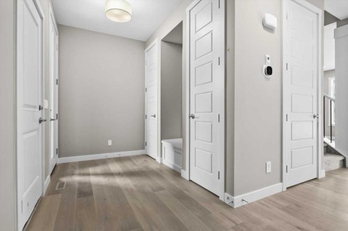 67 Agate Road, Cochrane, AB - Indoor Photo Showing Other Room